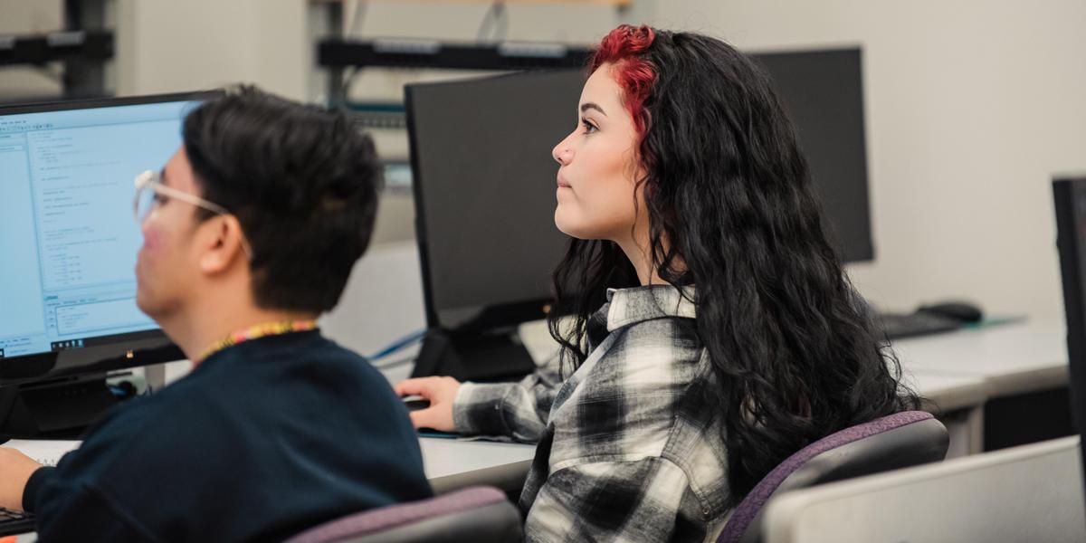 Student working on computer.